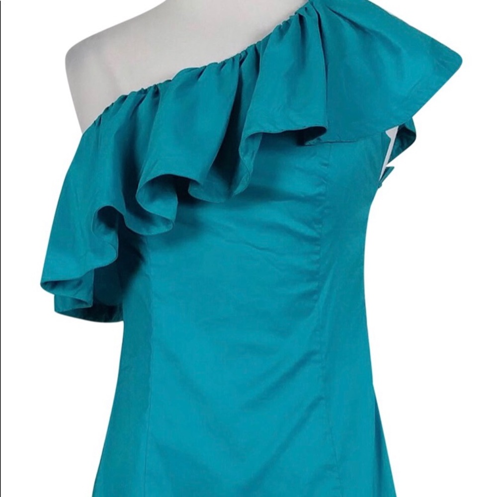 Beautiful, fun, Turquoise ruffled top!